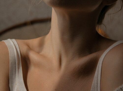 woman in white tank top