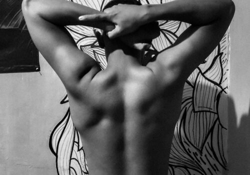 person standing in front of wall