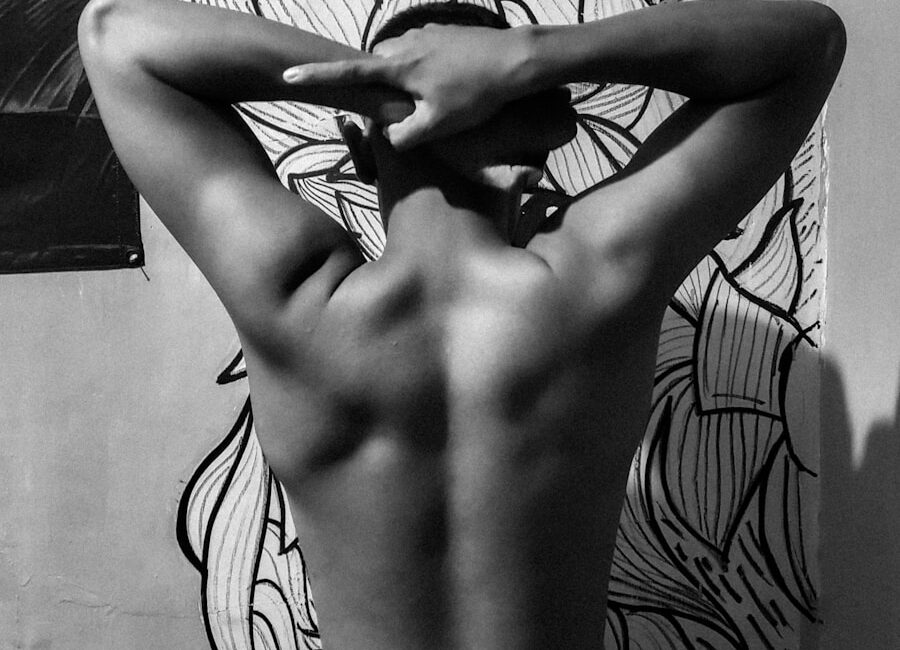 person standing in front of wall