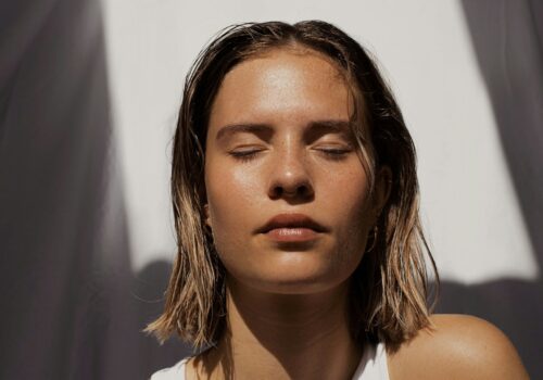 woman in white tank top