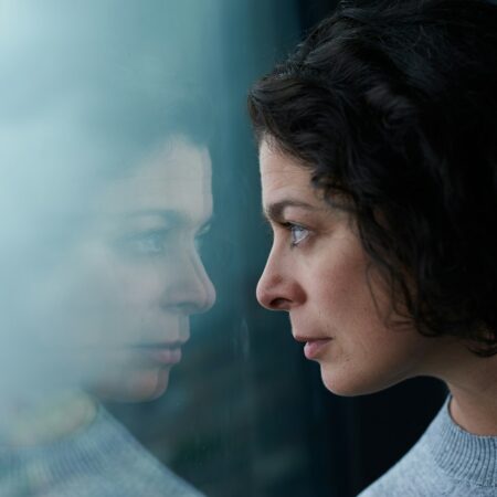 woman in gray crew neck shirt