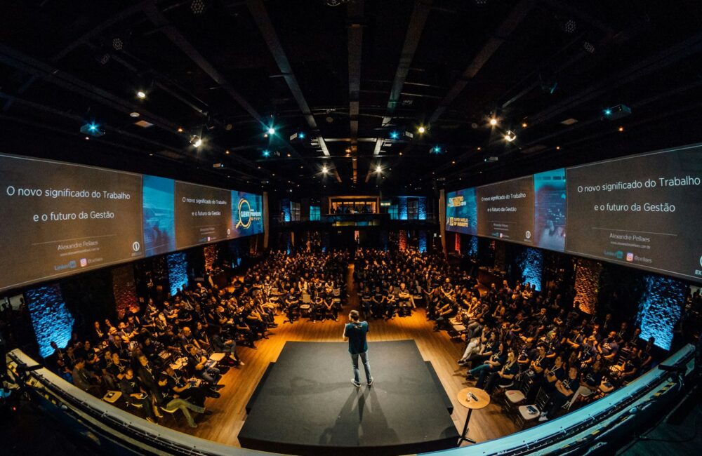people sitting on chairs watching a game
