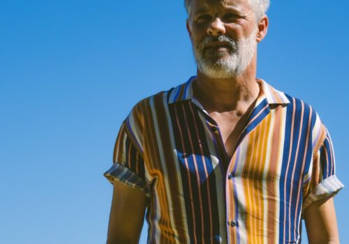 a man standing with his hands in his pockets